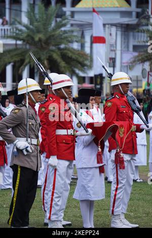 Indonesian flag raiser (paskibraka) in independence day ceremony Stock Photo