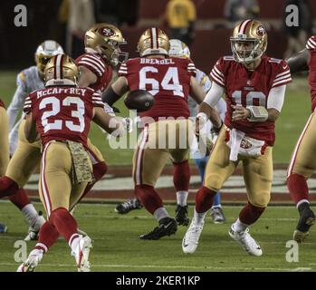 Santa Clara, United States. 13th Nov, 2022. San Francisco 49ers quarterback Jimmy Garoppolo (10) pitches to running back Christian McCaffrey (23) in the first quarter against the Los Angeles Chargers at Levi's Stadium in Santa Clara, California on Sunday, November 13, 2022. The 49ers defeated the Chargers 22-16. Photo by Terry Schmitt/UPI Credit: UPI/Alamy Live News Stock Photo