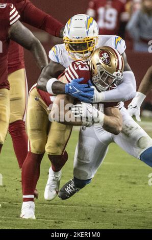 Santa Clara, United States. 13th Nov, 2022. San Francisco 49ers running back Christian McCaffrey (23) is wrapped up by Los Angeles Chargers linebacker Kenneth Murray Jr. (9) in the fourth quarter at Levi's Stadium in Santa Clara, California on Sunday, November 13, 2022. The 49ers defeated the Chargers 22-16. Photo by Terry Schmitt/UPI Credit: UPI/Alamy Live News Stock Photo