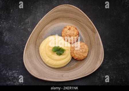 Steamed meat cutlets with boiled mashed potatoes Stock Photo