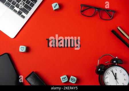 Technology Trends, Tech trends, Top New Technology. Word trends with different gadgets and devices on red background. Stock Photo