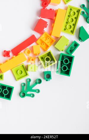 Multicolored plastic building blocks of the designer. Educational developing toys background.copz space Stock Photo