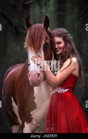 woman and Welsh Pony Stock Photo