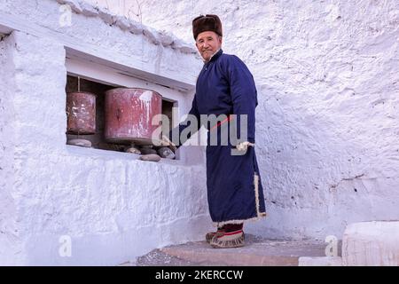 Elderly man in traditional Ladakhi clothes, Spituk Monastery (Gompa), Leh district, Ladakh, India Stock Photo