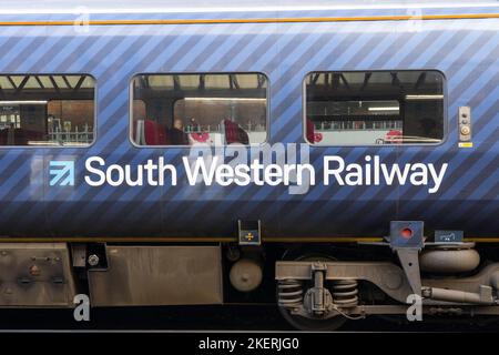 South Western Railway logo on the side of a passenger train coach at Basingstoke train station. England. Concept: rail franchise, ticket prices Stock Photo