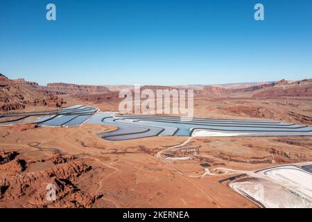 Evaporation ponds at a potash mine using a solution mining method for extracting potash near Moab, Utah. Stock Photo