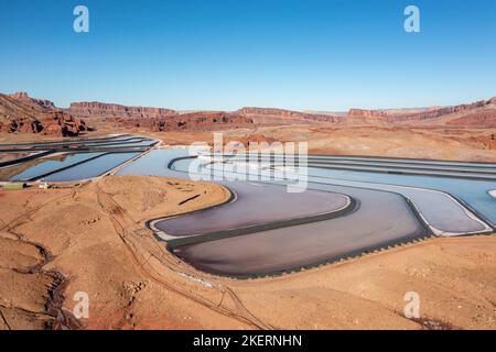 Evaporation ponds at a potash mine using a solution mining method for extracting potash near Moab, Utah. Stock Photo