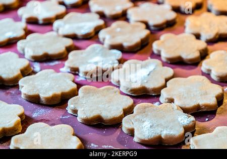 Christmas cookies on the baking sheet Stock Photo