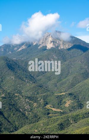 Clouds over Cerro Nueve Puntas, Sierra Mixe Range of the Sierra Madre de Oaxaca Mountains near Hierve el Agua, Mexico. Stock Photo