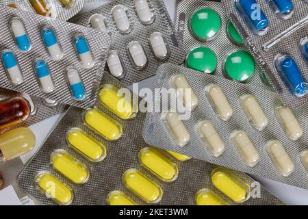 There are many different kinds of medicine pills packed in blister pack Stock Photo