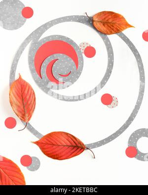 Abstract paper art geometric Autumn background. Fibonacci circle shapes, natural red orange Fall leaves, red circles. Flat lay, top view, romantic sea Stock Photo