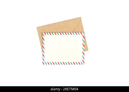 Craft paper envelope with blank letter isolated on white background. Stock Photo