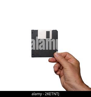 old floppy disk for data storage on hand on a transparent background Stock Photo