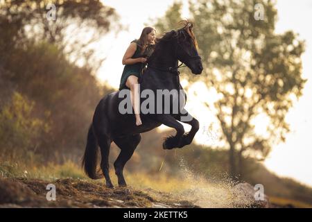 woman with horse Stock Photo
