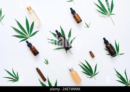Composition of natural oils and serums for personal hygiene with hemp extract. Flat lay. Cannabis oil in the production of cosmetics and for the pharm Stock Photo