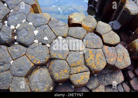 Columnar basalt formation. Basalt is an extrusive igneous rock, which ...