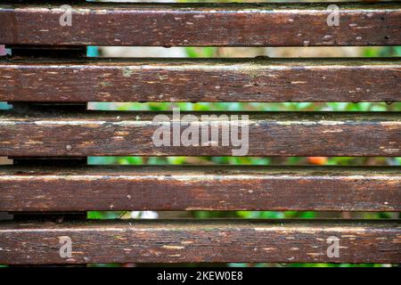 Wooden garden bench planks pattern closeup detailed image Stock Photo