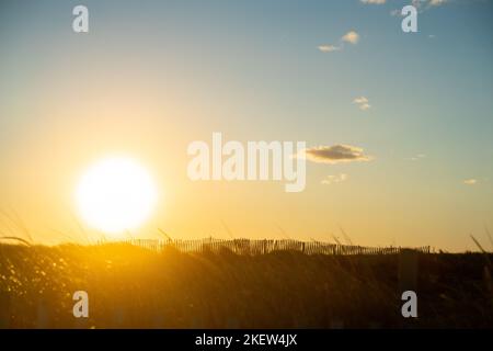 sun setting over the beaches of the hamptons in long island ny Stock Photo