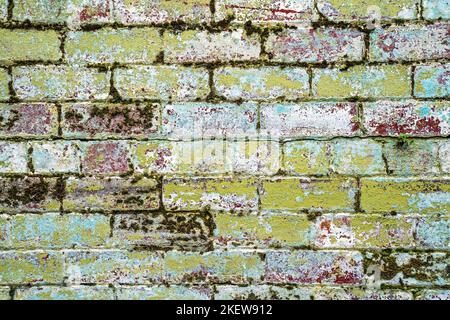 Weathered, painted, brick wall Stock Photo