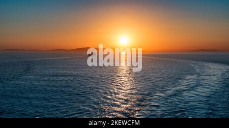 Sunset over the sea. Panoramic seascape. Stock Photo