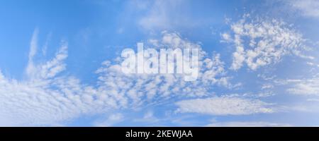 Bright blue dramatic cloudy sky large panoramic view. Huge pano with copy space on the sky Stock Photo