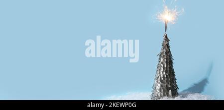 Handmade tree with Christmas sparklers on blue background with space for text Stock Photo