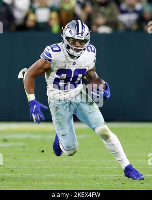 Arlington, Texas, USA. 29th Dec, 2019. Dallas Cowboys running back Tony  Pollard (20) tries to pull down a high pass during an NFL football game  between the Washington Redskins and Dallas Cowboys