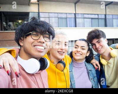 Group of multi-ethnic students having fun. POV Selfie Photo  Stock Photo