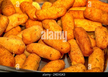 Potato Croquettes on baking tray and wire rack Stock Photo - Alamy