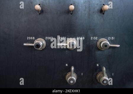 Close up of control panel on an abandoned machine. old panel with different buttons on the factory Stock Photo