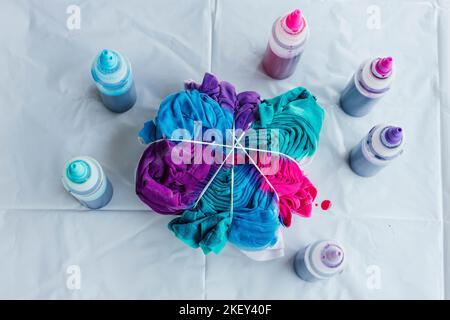 Tshirt Being tie dyed tie dying craft pattern Stock Photo