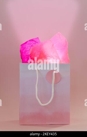 Gift bag with Light shinging out of it surprise gift exciting present Stock Photo