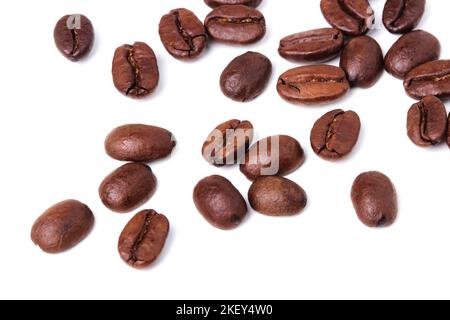 Coffee beans are scattered on a white background Stock Photo