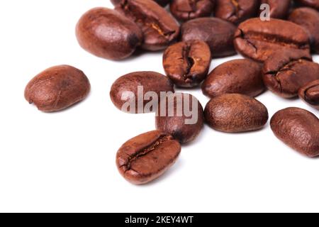 Coffee beans are scattered on a white background Stock Photo
