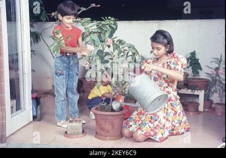 Three Children of a Family, Bombay, India Stock Photo