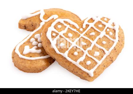 Decorated Christmas gingerbread cookies isolated on white. Stock Photo