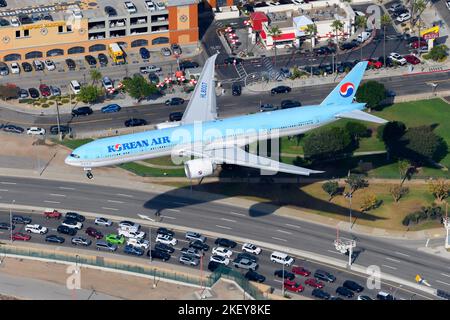 Korean Air Boeing 777 airplane landing at airport. Aircraft 777-300ER registered as HL8007 fo KoreanAir, also know as Korean Airlines. Stock Photo