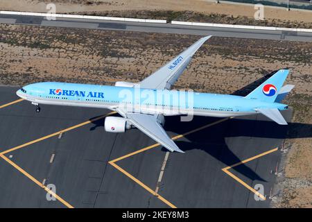 Korean Air Boeing 777 aircraft landing at airport. Airplane 777-300ER registered as HL8007 belonging to Korean Air, also know as Korean Airlines. Stock Photo