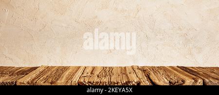 Very old wood podium table near stone wall texture Stock Photo