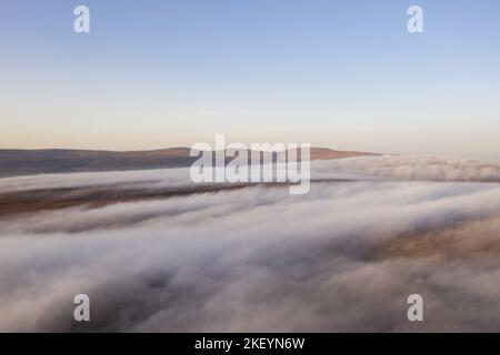 Great Dun Fell, Little Dun Fell and Cross Fell Rising above Cloud, Viewed from Upper Teesdale, County Durham, UK Stock Photo