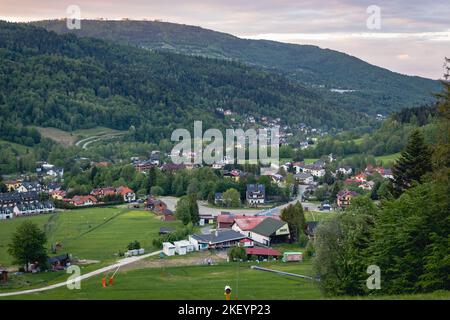 View on Szczyrk town in Silesian Beskids mountains, Bielsko County, Silesian Voivodeship in southern Poland Stock Photo