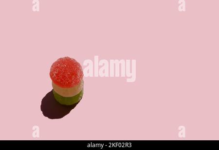 jelly candies on a pink background. Sweet scenes with candies Stock Photo