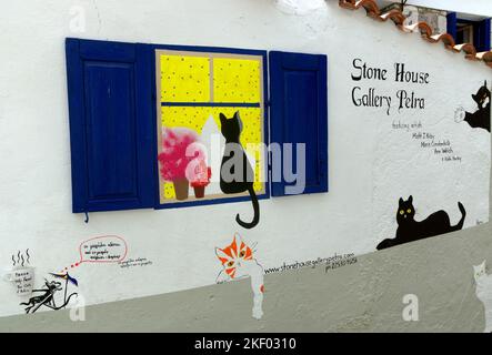 Wall painted with cats and mice, Stone House Gallery, Petra, Lesbos, Northern Aegean Islands, Greece. Stock Photo