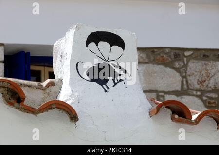 Wall painted with cats and mice, Stone House Gallery, Petra, Lesbos, Northern Aegean Islands, Greece. Stock Photo