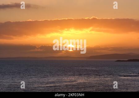 Sunset over the Llyn Peninsula, seen from Dinas, Criccieth, Gwynedd, Wales Stock Photo