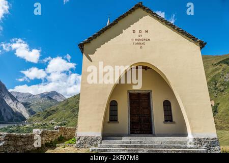 beautiful little catholic church on top of a hill in the mountains in Formazza Valley Stock Photo