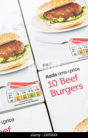 Label on cardboard packet of ASDA supermarket own-label economy beef burgers (mid-2022). For paperboard food packaging, convenience food. Stock Photo