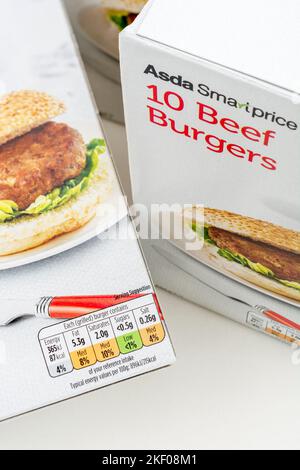 Label on cardboard packet of ASDA supermarket own-label economy beef burgers (mid-2022). For paperboard food packaging, convenience food. Stock Photo