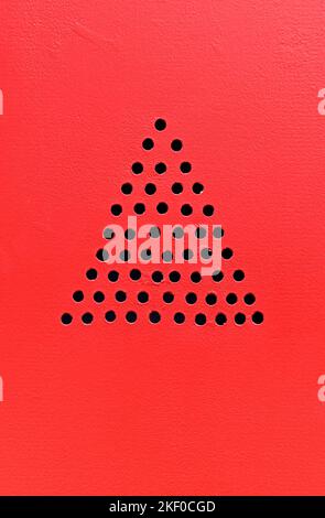 Triangle shaped perforated metal sheet Stock Photo