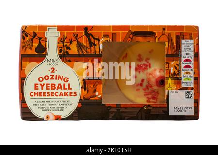 2 oozing eyeball cheesecakes creamy cheesecake filled with tangy blood raspberry compote and dipped in white chocolate isolated on white background Stock Photo